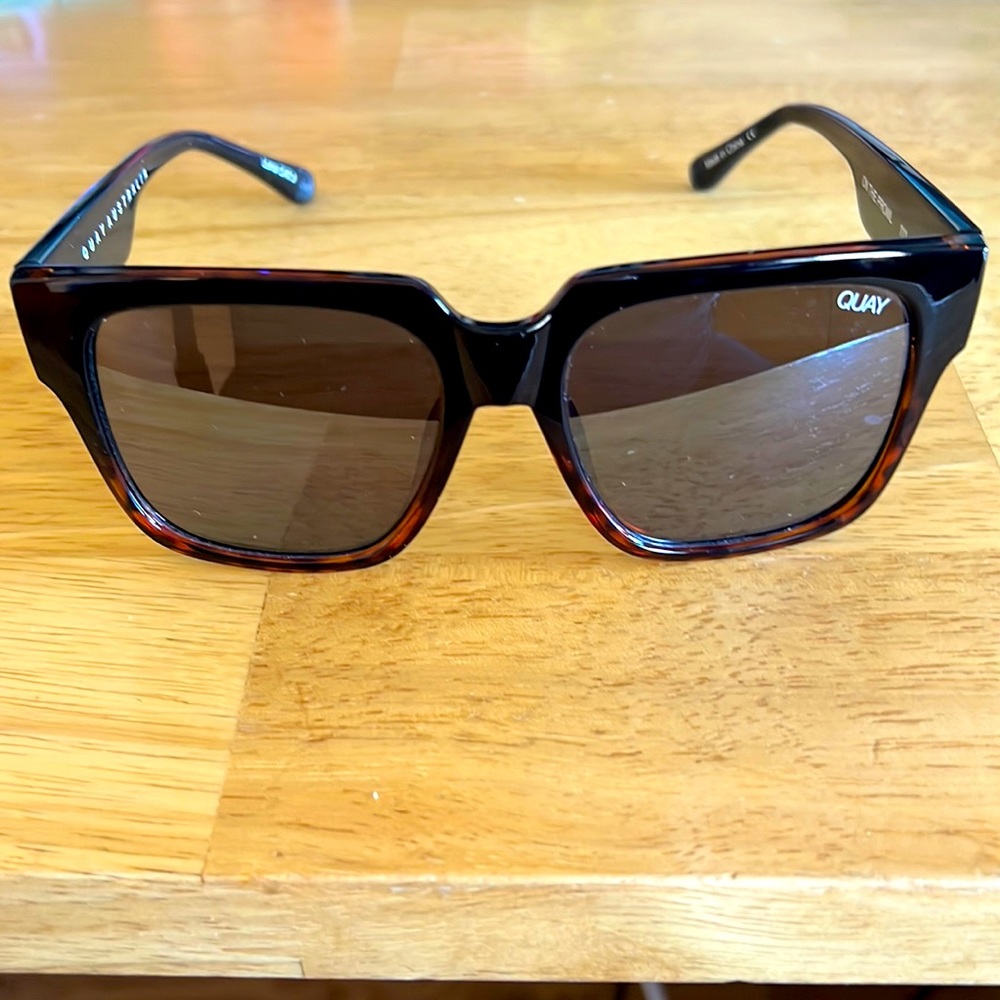 Quay “ on the prowl” sunglasses. NWOT but has comes with soft case.
